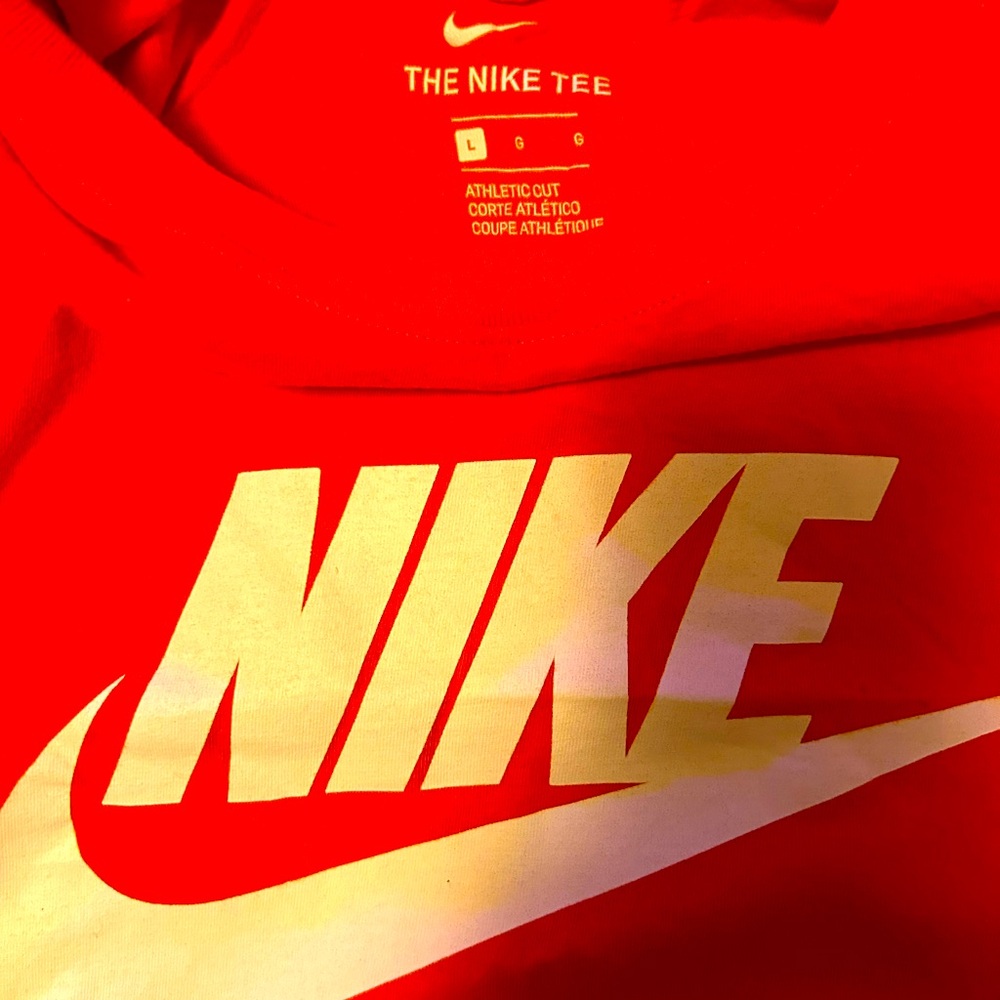 Orange Nike short sleeve shirt